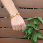Gold-plated 999 Pixiu bracelet with Yellow Phantom (“tower”) quartz and rotating Heart Sutra beads