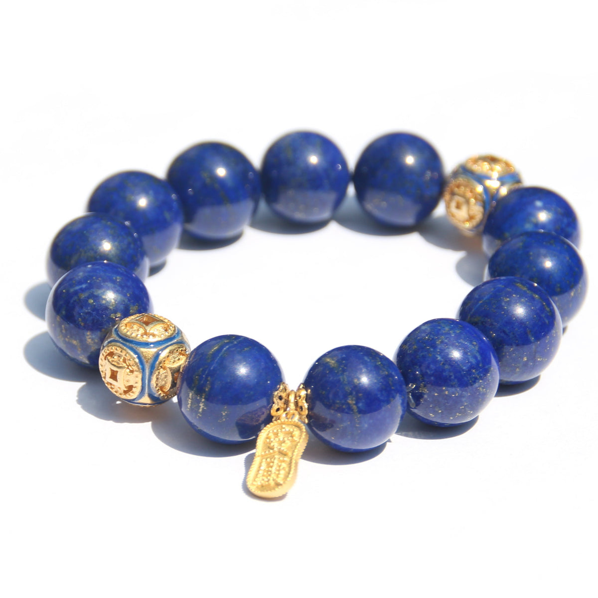 Engraved 喜乐安康 charm detail on lapis bracelet
