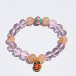 Rose quartz 12mm and rutilated quartz 12mm bracelet with gold-plated 925 Fortune Pouch
