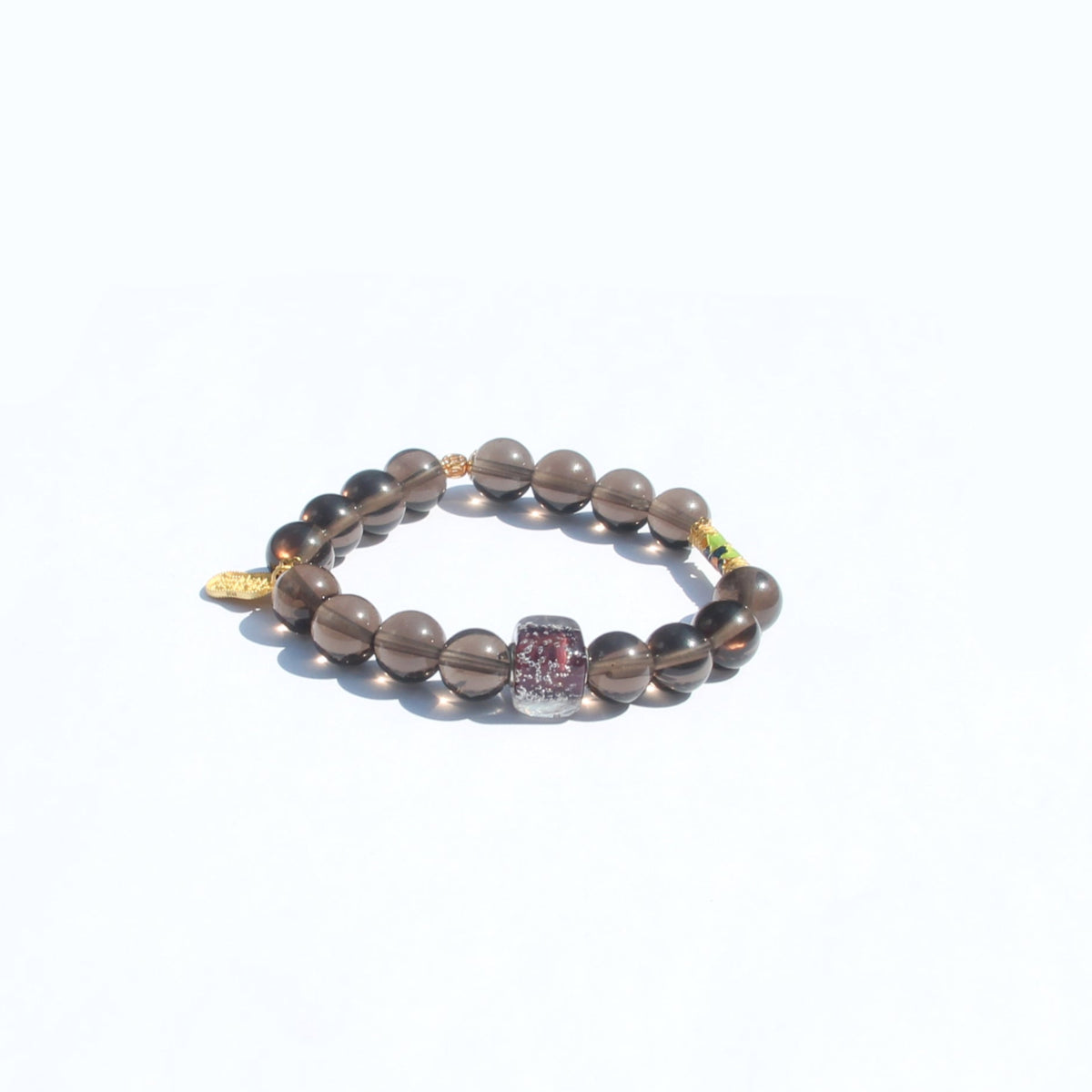 Smoky quartz bracelet with gold-plated 925 silver accents